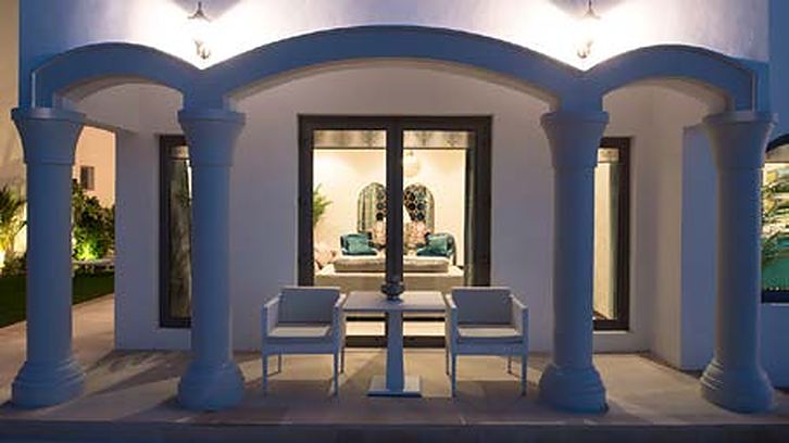 Villa arches lit at night