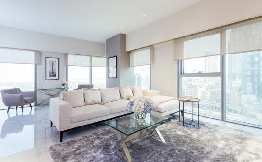 Central Park Tower apartment lounge with landscape views of DIFC
